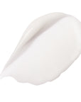 White cosmetic sponge on a white background