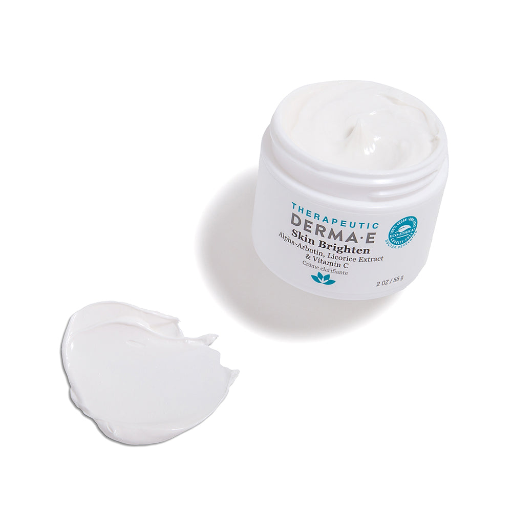Skin Brighten jar with a smear of product on the side