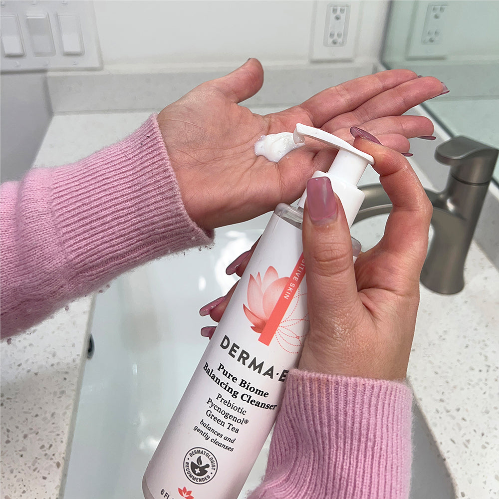 Hands using Pure Biome Balancing Cleanser