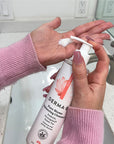 Hands using Pure Biome Balancing Cleanser