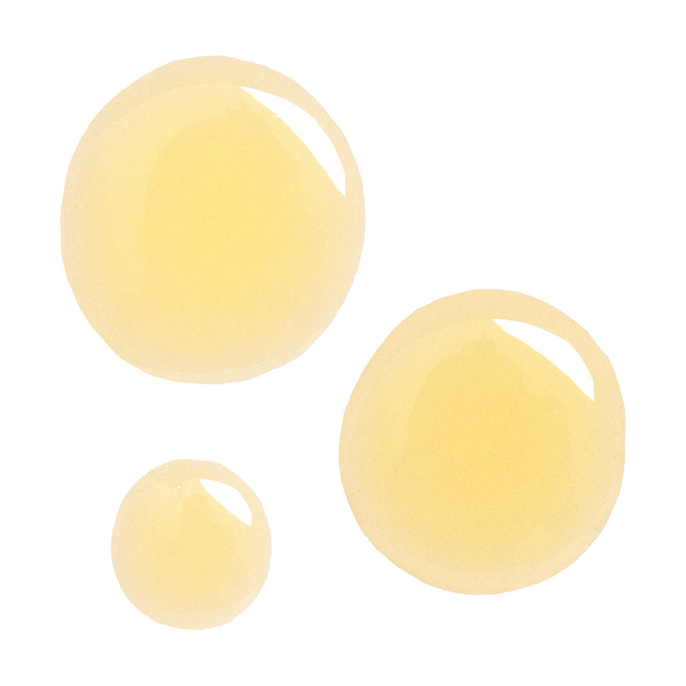 Close-up view of the yellow oil texture of Derma E Anti-Wrinkle Treatment Oil.