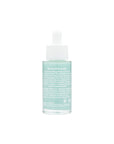 "Close-up of a translucent bottle with a white dropper cap, labeled 'Stress-free scalp'. The product mentions ingredients like Tea Tree Oil and Menthol, with detailed usage instructions, set against a white background."