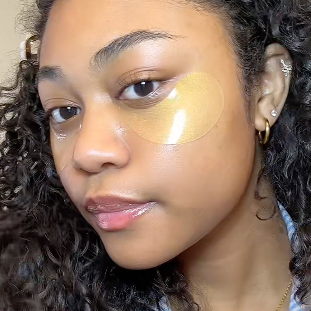 Woman with a concealer patch on her face