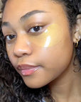Woman with a concealer patch on her face