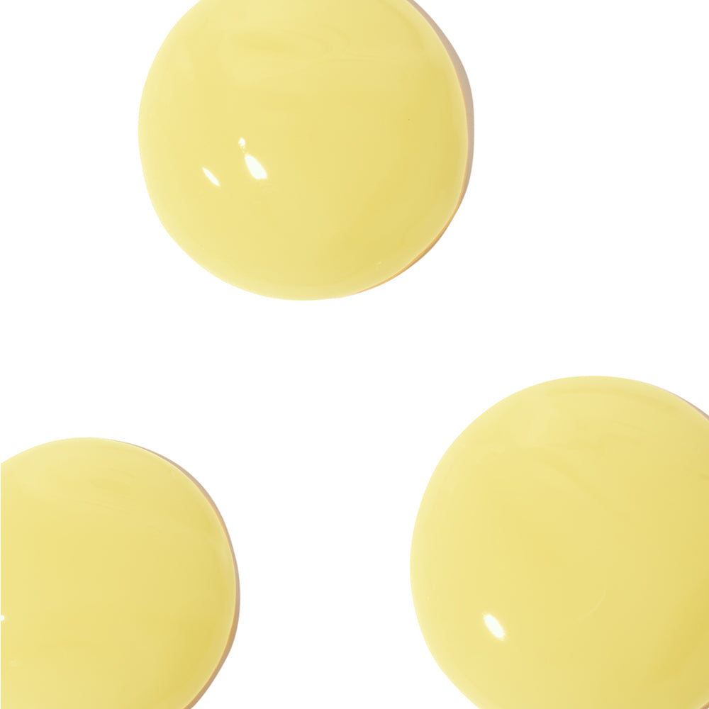 Three yellow circular objects on a white background