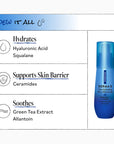 Blue skincare serum bottle with benefits listed on a white background