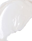 Close-up of a white, glossy substance on a white background