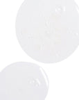 Two white round objects on a white background