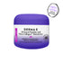 Derma-E moisturizer jar with purple lid and white label on a white background
