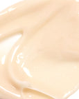 Close-up of the creamy texture of Derma E Vitamin C Renewing Moisturizer, showcasing its smooth and rich consistency.