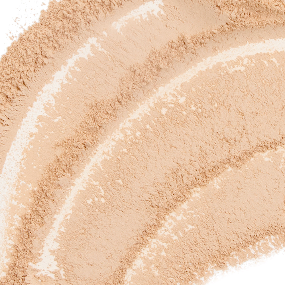 Close-up view of Derma E Sun Protection Mineral Powder SPF 30, showing its smooth and lightweight texture.