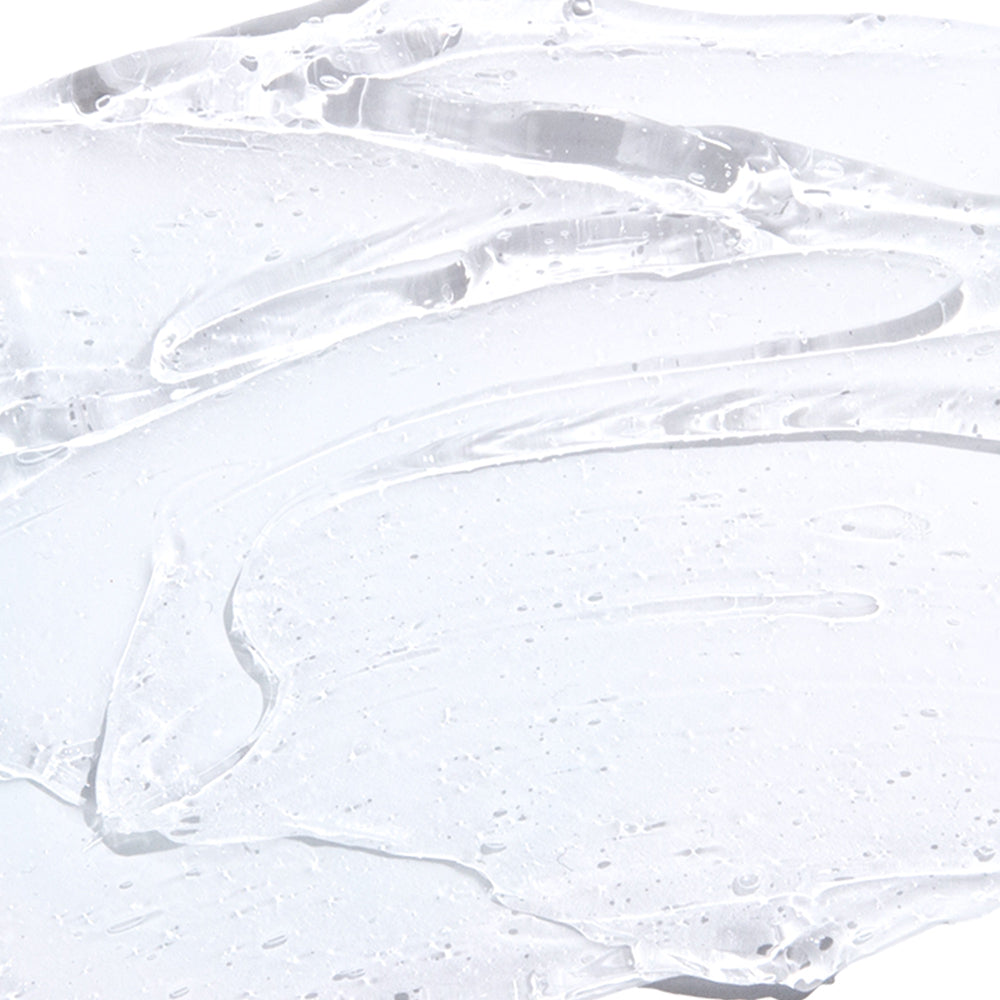 Close-up texture of Derma E skincare product with a clear, smooth gel-like consistency.