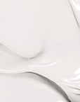 Close-up of the Fragrance-Free Vitamin E Body Lotion, showing the smooth and creamy texture